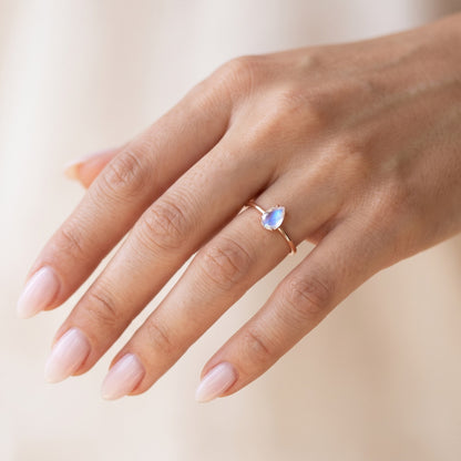 Rose gold moonstone ring worn on the hand