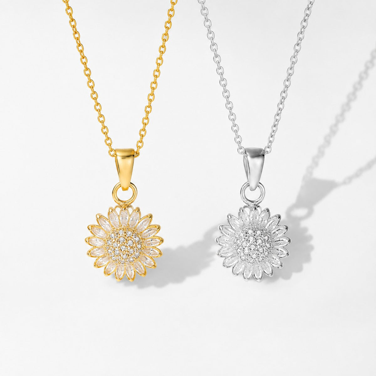 Gold and silver sunflower spinning pendants