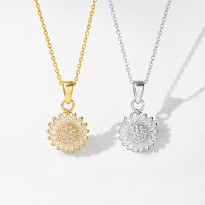 Gold and silver sunflower spinning pendants