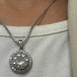 Woman wearing the sunflower spinning pendant