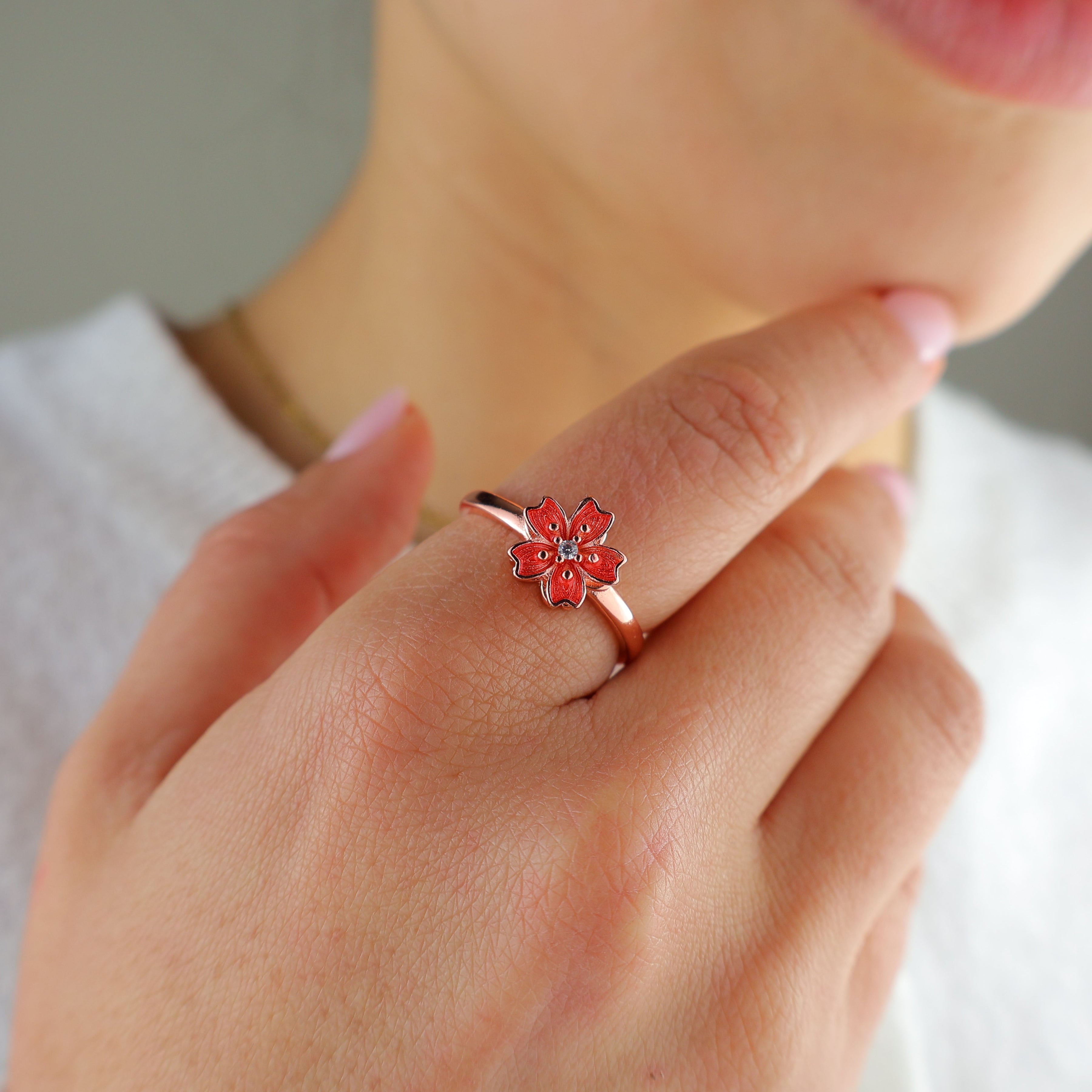 Blossom ring worn near the face