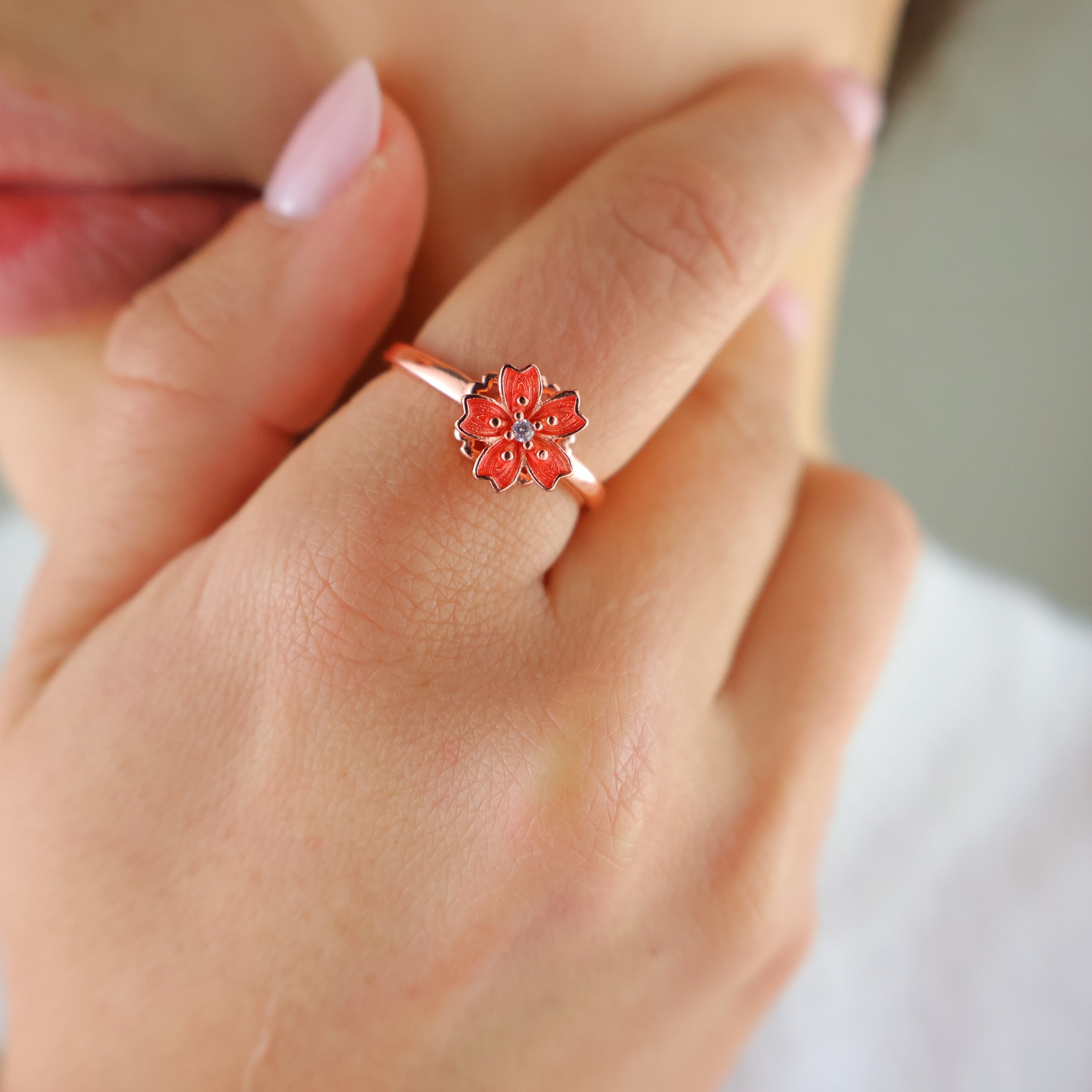 Close-up of the rose gold blossom ring