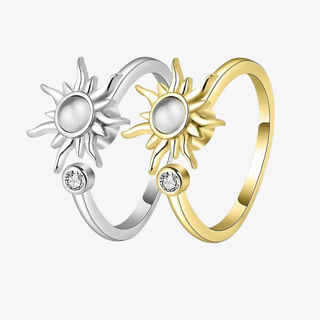 Elegance sun spinner ring in silver and gold