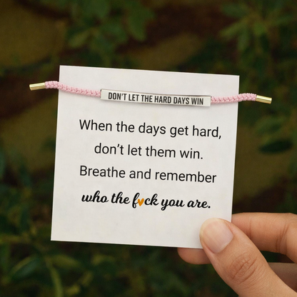 Pink and silver Don't Let The Hard Days Win bracelet