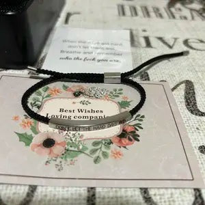 Black bracelet on a gift card