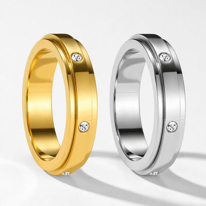 Gold and silver spinner rings with sparkling stones