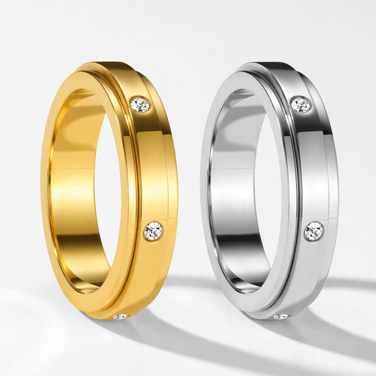 Gold and silver spinner rings with sparkling stones