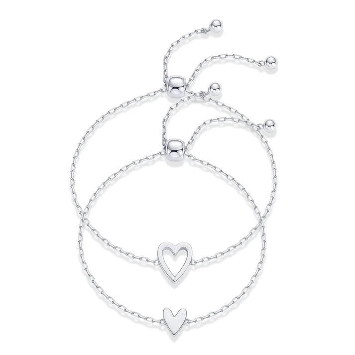 Matching Hearts Set in silver: solid heart and open heart bracelets