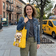 Woman carrying the Loovina bee costume tote in the city