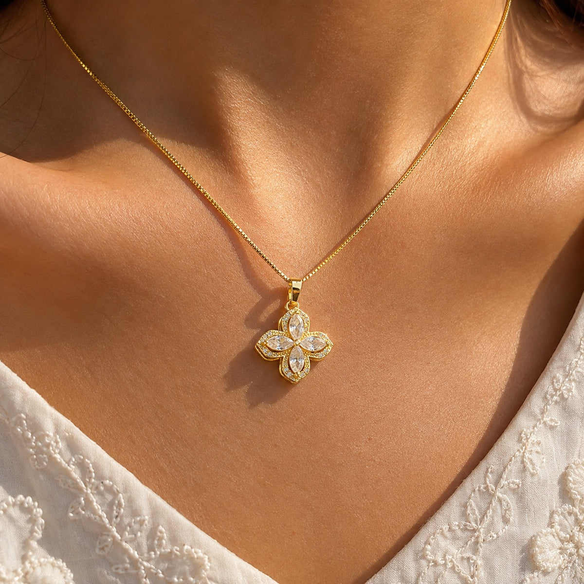 Radiance spinning pendant worn on the neckline