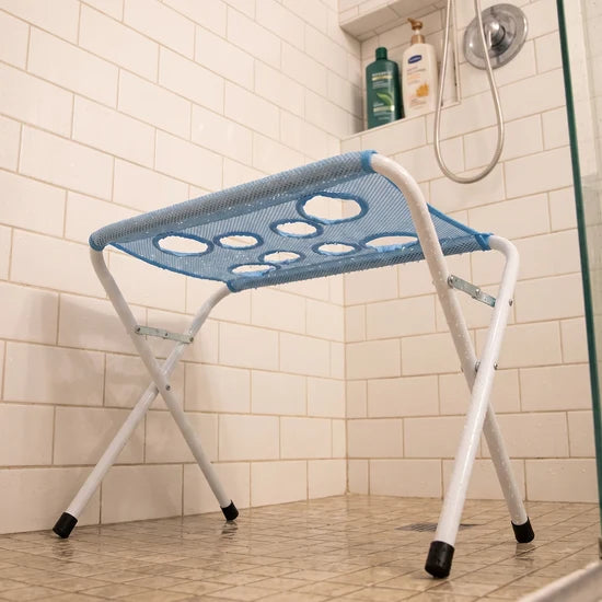 Loovina Dog Shower Stand set up in a tiled shower