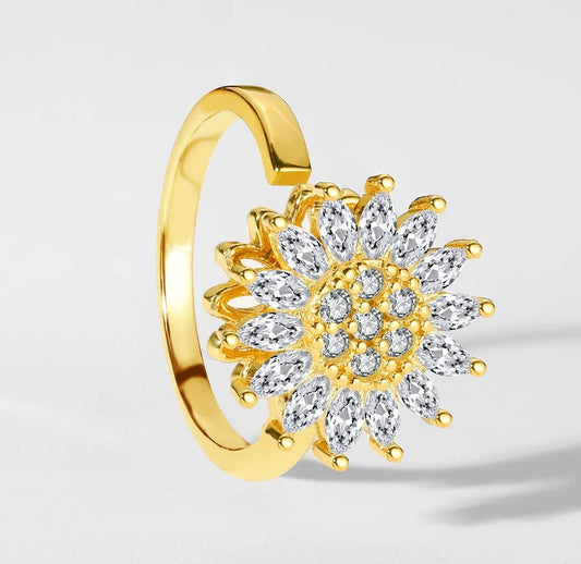 Gold open ring with a spinning crystal sunflower